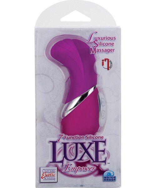 Roze mini vibrator Calexotics Silicone Luxe Empower met een gebogen, geribbelde top