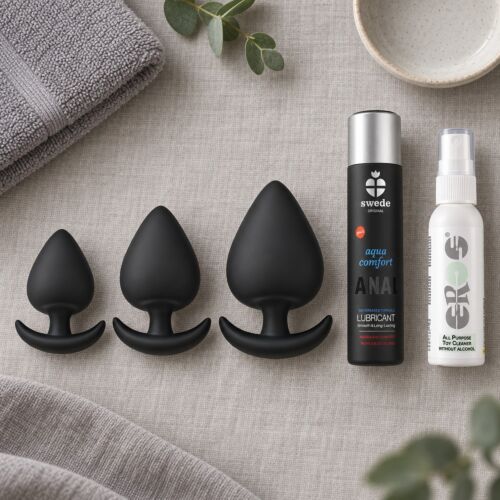 Set voor geleidelijk anaal oprekken met drie siliconen buttplugs – sfeerbeeld (met AI gegenereerde afbeelding)
